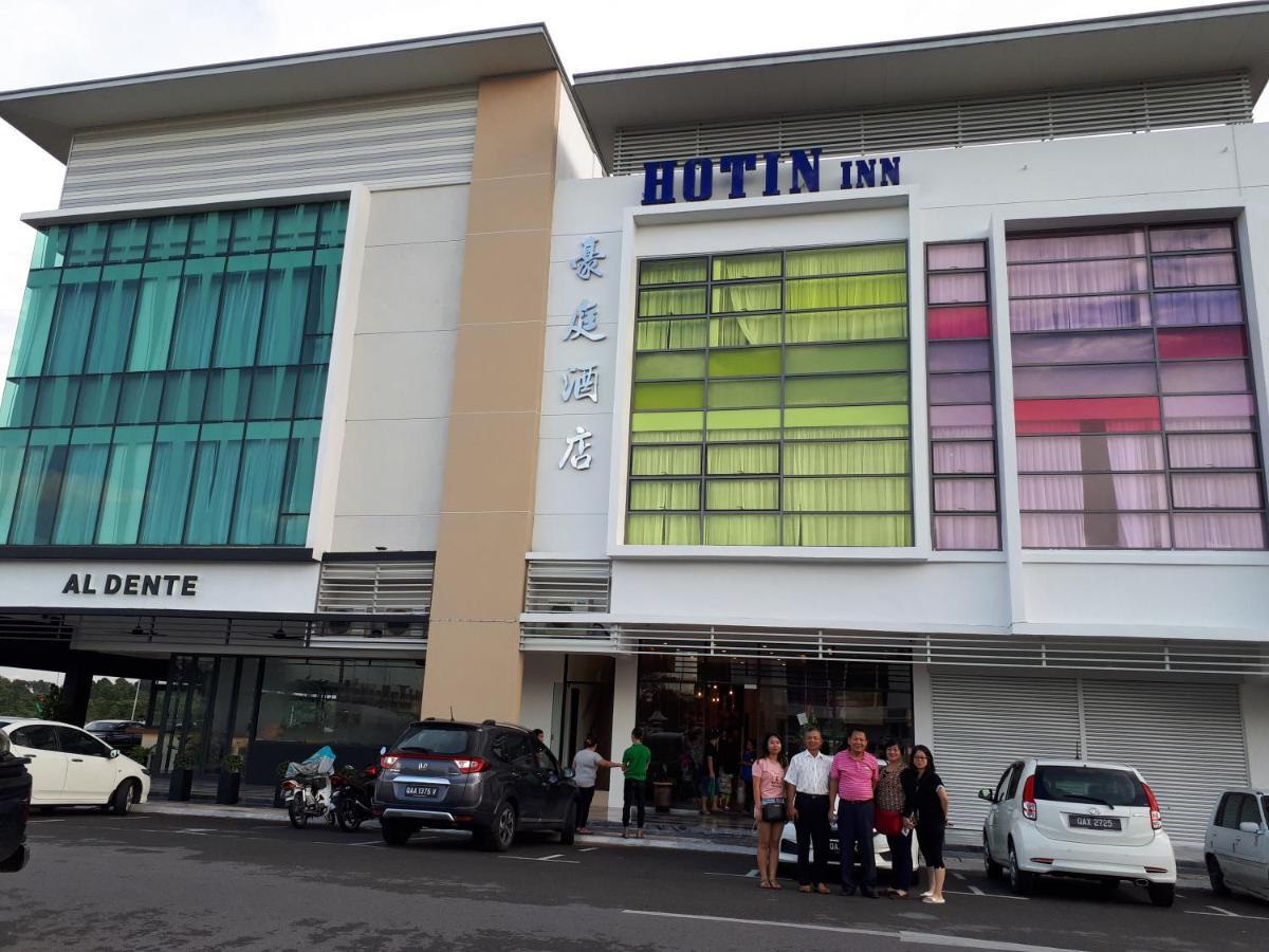 Hotin Inn Kuching Bagian luar foto