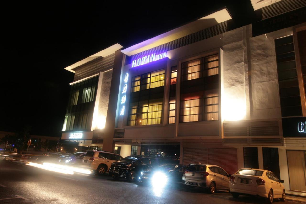 Hotin Inn Kuching Bagian luar foto
