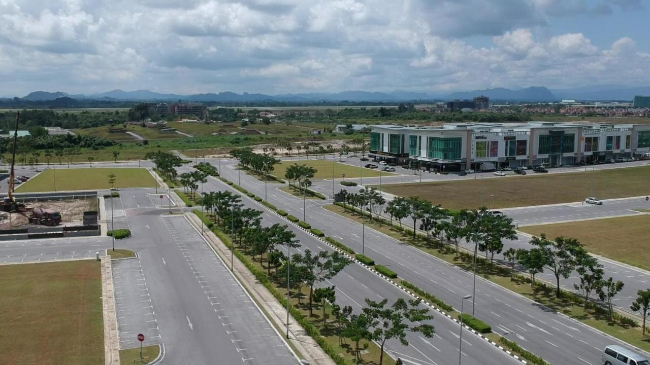 Hotin Inn Kuching Bagian luar foto