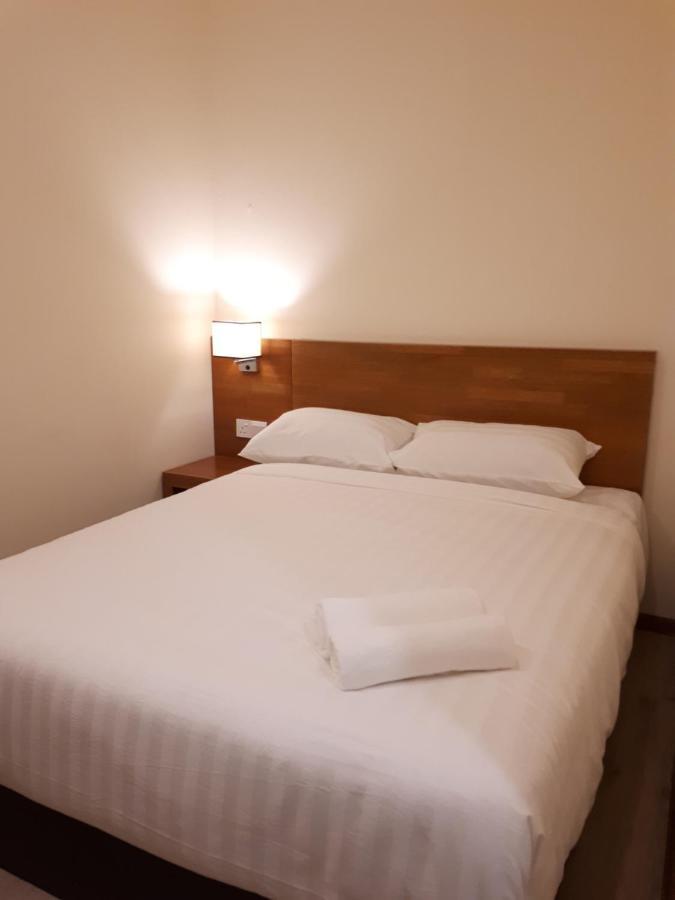 Hotin Inn Kuching Bagian luar foto