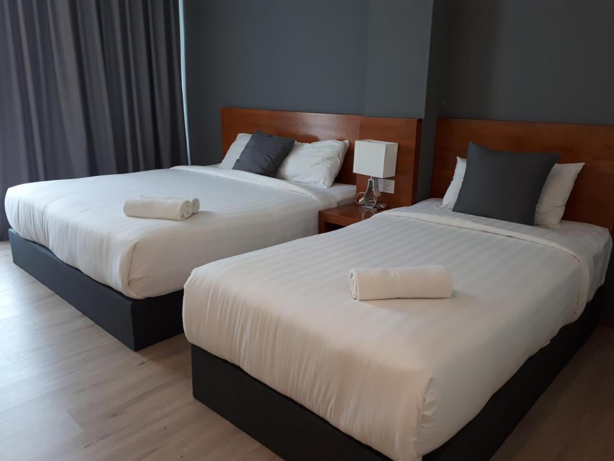 Hotin Inn Kuching Bagian luar foto